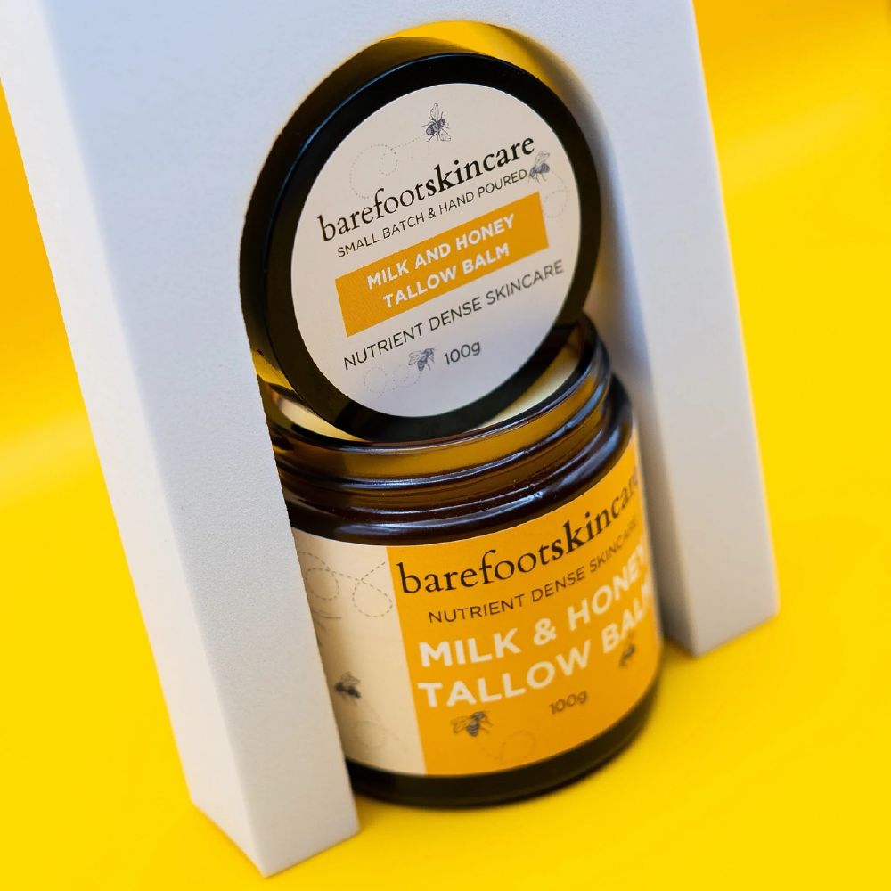 Barefoot Skincare Milk & Honey Tallow Balm jar displayed in box packaging on yellow background