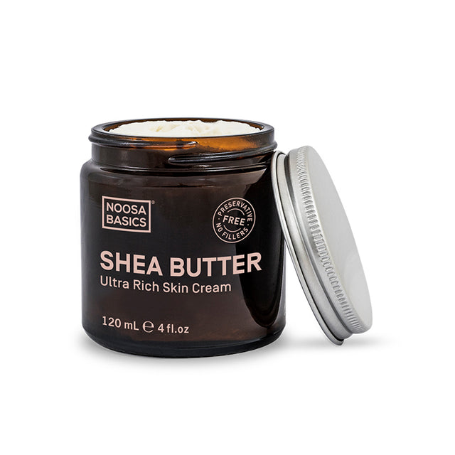 Jar of Noosa Basics Shea Butter Ultra Rich Skin Cream with open lid on a white background
